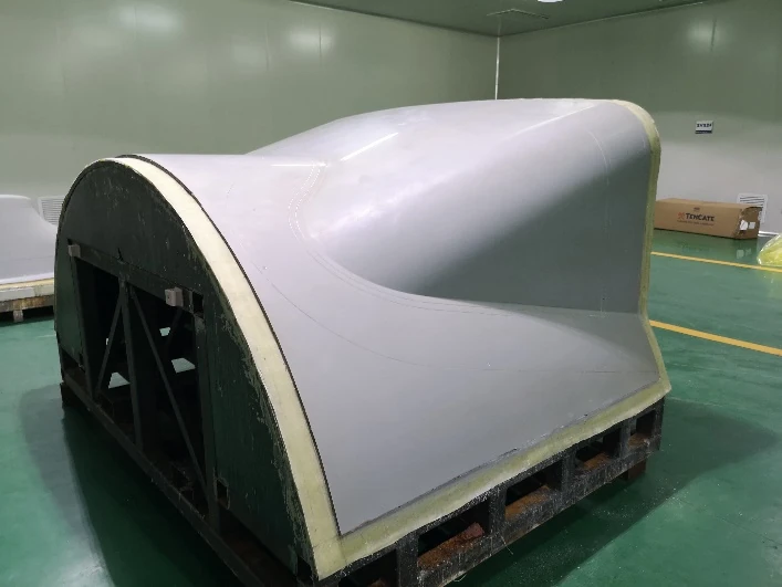 Finished master model surface supported on a steel-frame construction, from EPTEK aerospace presentation
